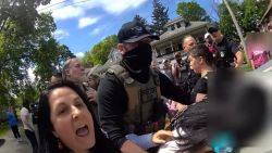 Bystanders in Worcester, Massachusettes, can be seen in local police bodycam footage trying to stop the arrest of a woman by ICE in early May, some residents even using their bodies to physically block the agent's vehicle.