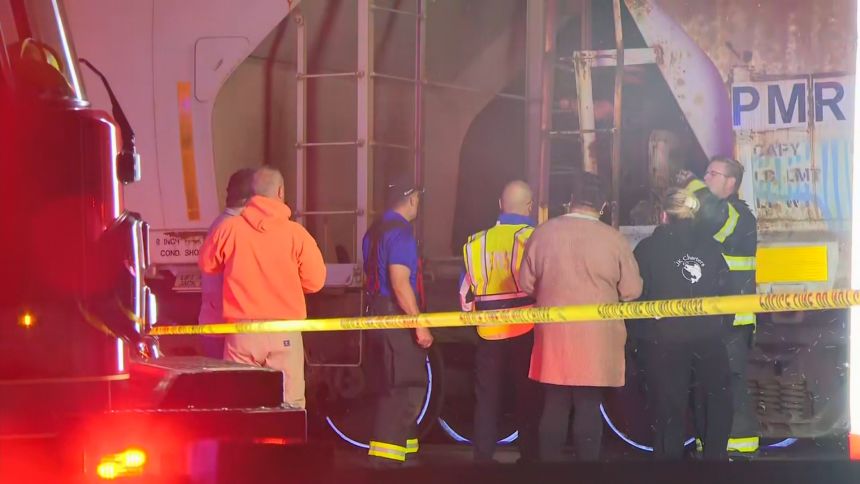 Investigators respond after a train hit pedestrians on a bridge in Freemont, Ohio.