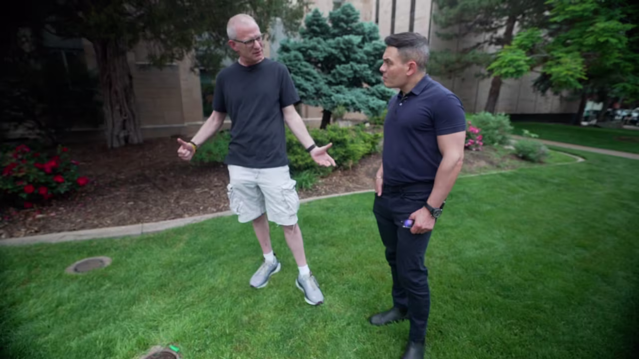 Aaron Brooks, left, talks with CNN's Shimon Prokupecz about what he witnessed during the attack on Sunday.