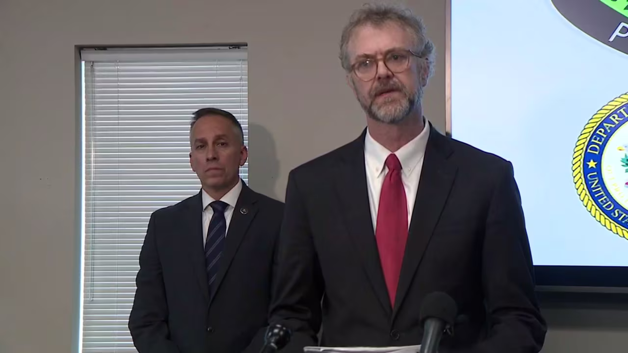 Acting United States Attorney for the District of Colorado J. Bishop Grewell speaks during a press conference on Monday.