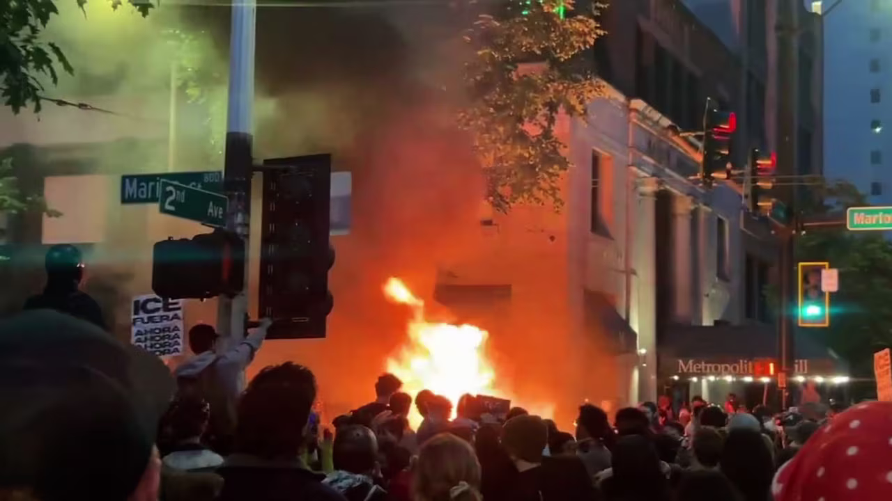 This screengrab taken from a video shows a fire burning during a protest against Immigrations and Customs Enforcement in Seattle, Washington, on Wednesday.