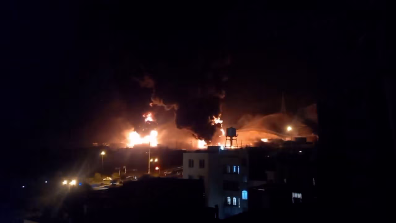 A still from a video shows the Sharhan oil depot on fire near Tehran on Saturday.