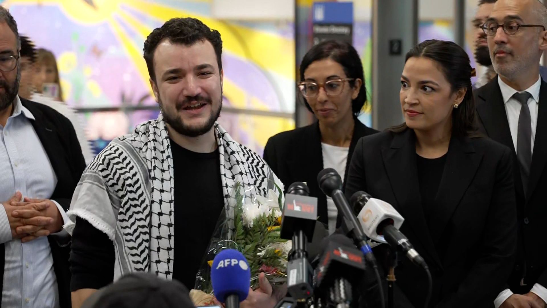 A crowd erupted into cheers for Mahmoud Khalil, his wife and child as they arrived at Newark Airport on Saturday following Khalil's released on bail from a Louisiana ICE detention center, more than three months after he was arrested outside his apartment on Columbia University’s campus. CNN's Gloria Pazmino was at the airport for his arrival, which included the presence of Congresswoman Alexandria Ocasio-Cortez.