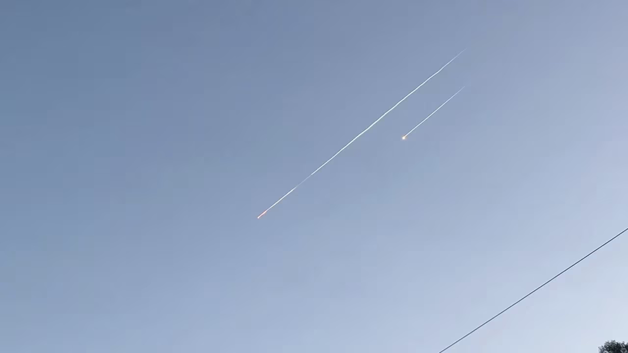 This screengrab shows rockets flying through the sky in Jerusalem.