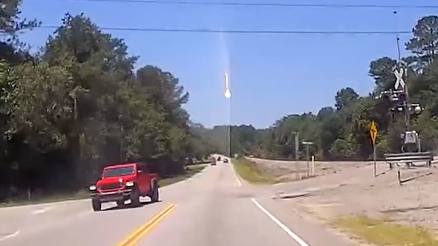 Dashcam video from show a big flash of light coming down from the sky in Lexington County, South Carolina, Thursday.