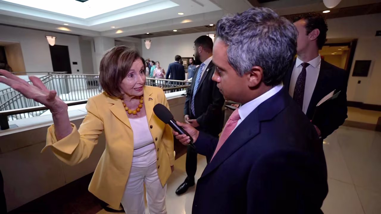 Former House Speaker Nancy Pelosi talks to CNN's Manu Raju on Friday.