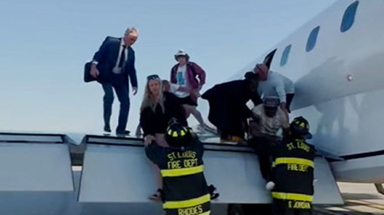 Video shot by passenger Dominic Gagliardotto showed passengers climbing onto the wing of the plane as flight attendants shouted to “leave everything behind”