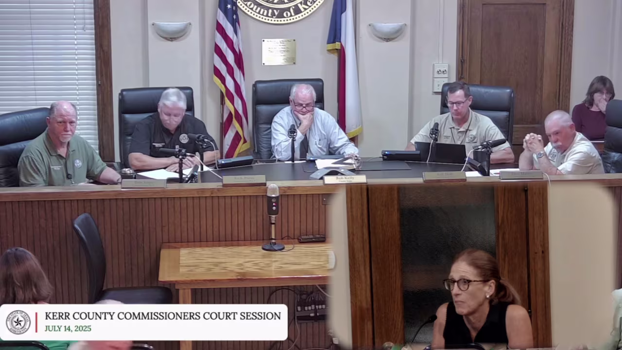 A Kerr County resident speaks at a Kerr County Commissioners meeting on Monday.
