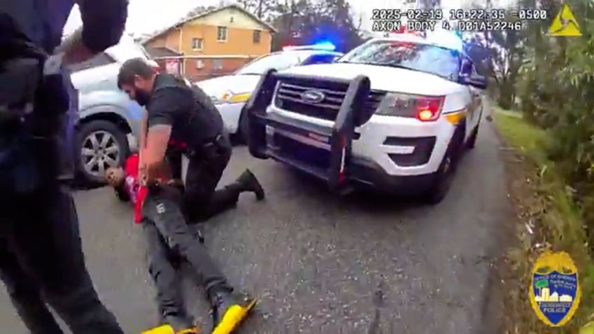 An image taken from video released by the Jacksonville Sheriff's Office show's McNeil on the ground.