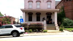 Police work the scene where city council member Lee Vogler was set on fire by a man police says he knows on July 30, 2025.