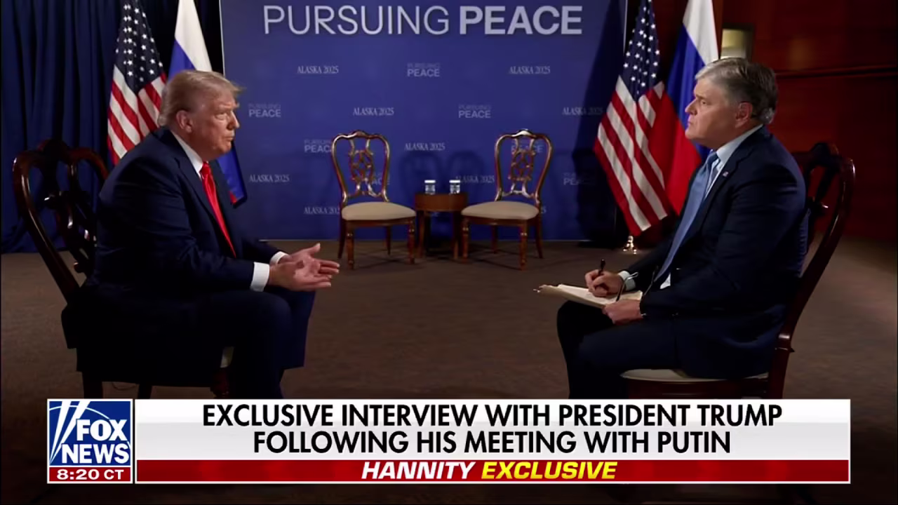 President Donald Trump sits for an interview with Fox News host Sean Hannity, following Trump’s meeting with Russian President Vladimir Putin on Friday.