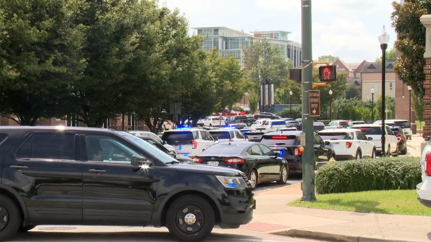Law enforcement respond to reports of shots fired at the University of Tennessee at Chattanooga on August 21.