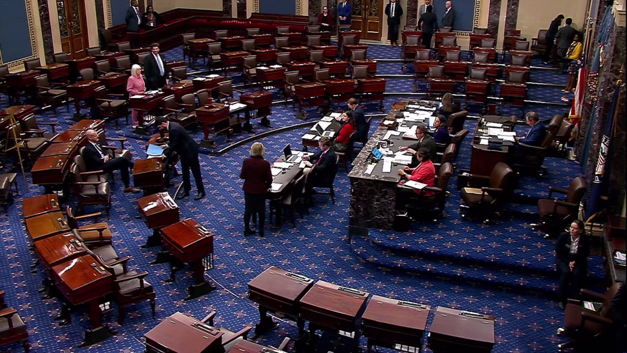 Lawmakers on the Senate floor on Tuesday.