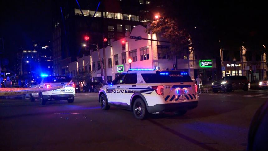 Police work the scene of a stabbing on Charlotte, North Carolina, light rail train on August 22.