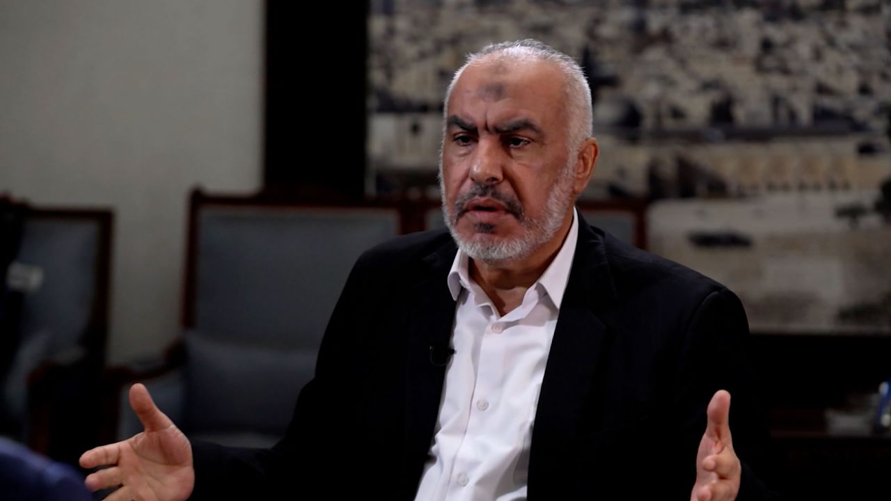 Ghazi Hamad speaks during an interview.