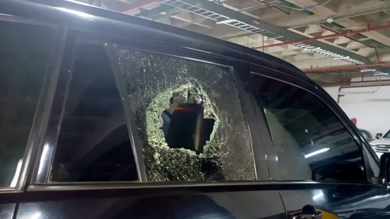 Convoy carrying Ecuadorian president attacked during protests, officials say