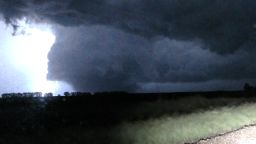 A tornado that roared through part of eastern North Dakota in June and killed three people was upgraded to an EF5 with winds of 210 mph, the National Weather Service in Grand Forks, North Dakota, confirmed Monday.