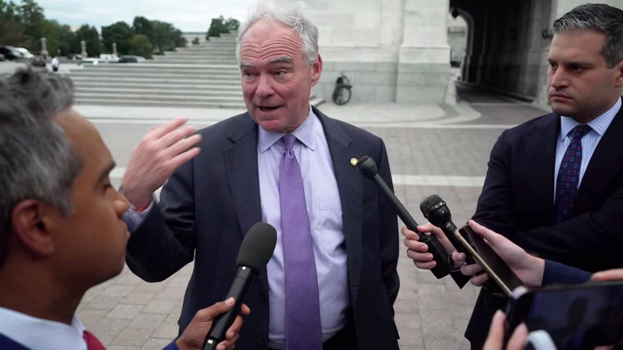 Sen. Tim Kaine speaks to members of the media on Tuesday.