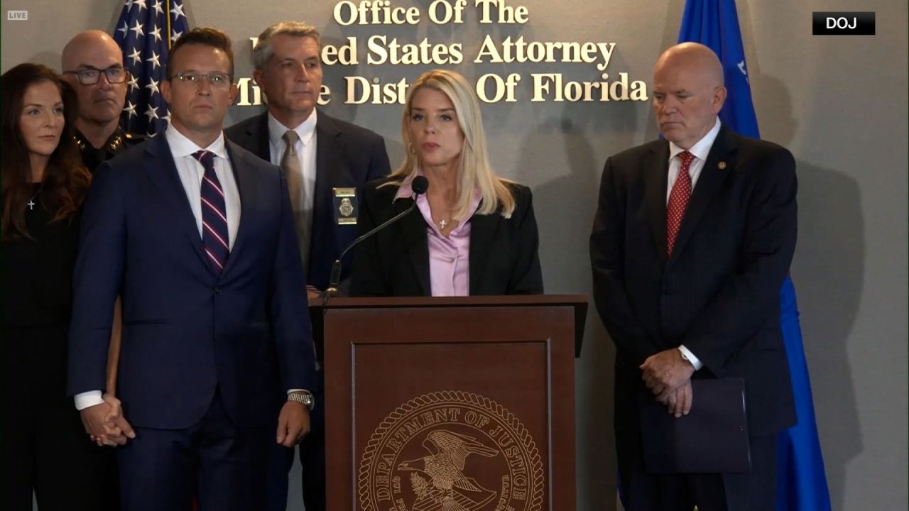 In this screengrab taken from a video, Attorney General Pam Bondi host a press conference alongside conservative podcaster Benny Johnson, third from left, in Tampa, Florida, on Friday, October 10, 2025.