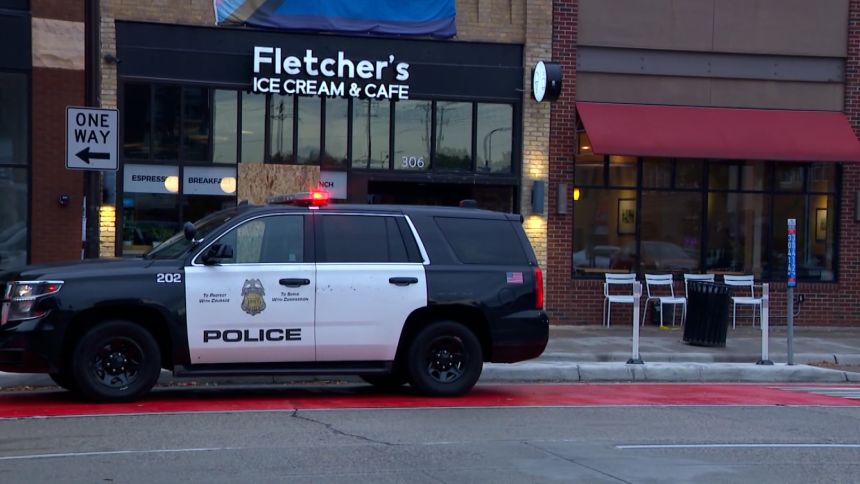 Police are seen outside of Fletcher's Ice Cream & Cafe in Minneapolis.