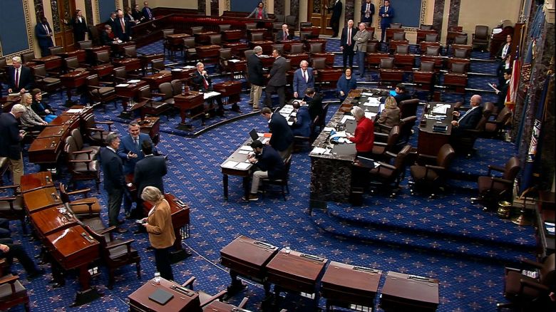 Senators vote on the funding plan on the Senate floor on Sunday.