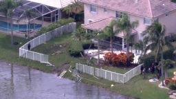 Damage from a plane crash is seen in Coral Springs, Florida, on November 10, 2025.