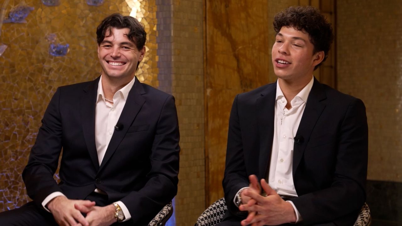 Taylor Fritz, left, and Ben Shelton talk to CNN's Amanda Davies in Turin, Italy.