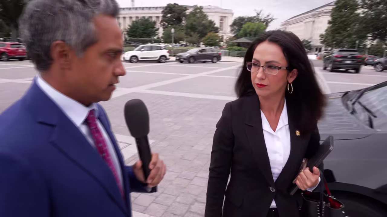 Rep. Lauren Boebert, right, speaks with CNN's Manu Raju on Wednesday.