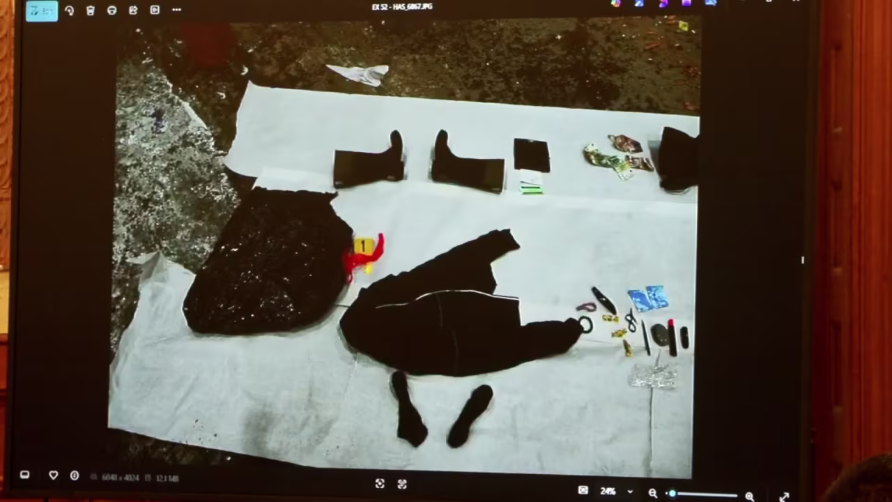 An image of items recovered from a dumpster are shown in court on Tuesday.