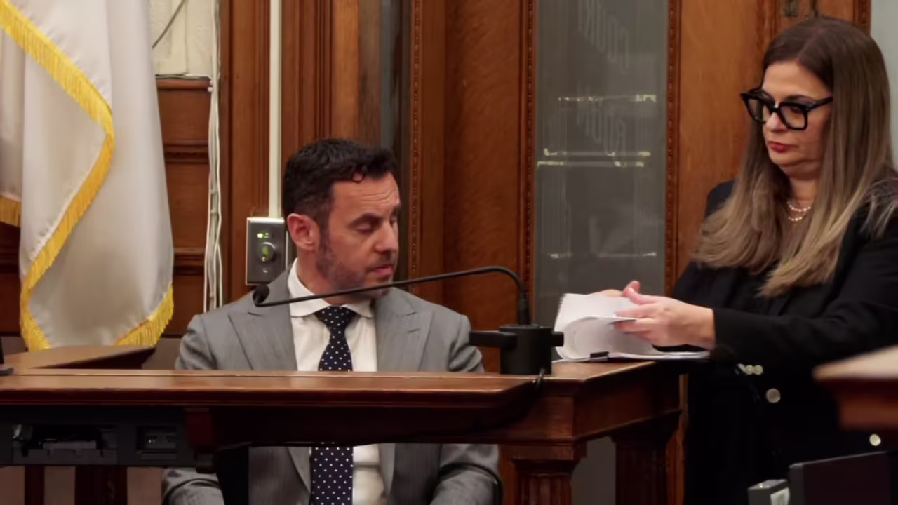 In court today, prosecutor Anne Yas shows William Fastow a photo he received from Ana Walshe showing her with Gem Mutlu and one of her sons on New Year’s Eve.