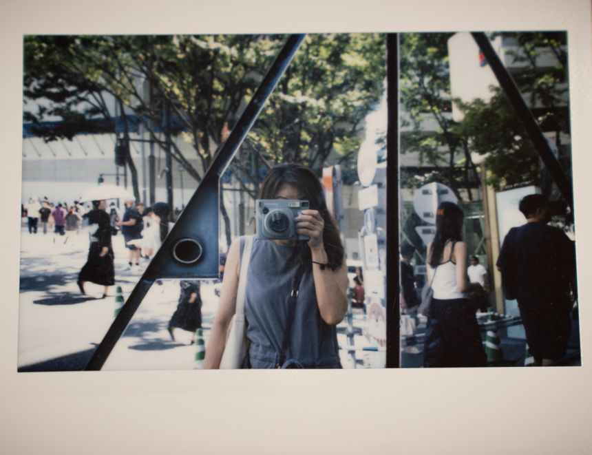 <em> CNN producer Asada Yumi takes a mirror selfie using an Instax Wide 400 camera in Tokyo, Japan.</em>” class=”image_large__dam-img image_large__dam-img–loading” onload=”this.classList.remove(‘image_large__dam-img–loading’)” onerror=”imageLoadError(this)” height=”1846″ width=”2400″ loading=”lazy”/>
    </div>
</div>
<p class=