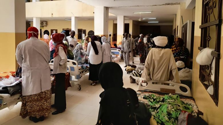 People wait to receive treatment at a hospital in El Fasher, Sudan, in May 2023.