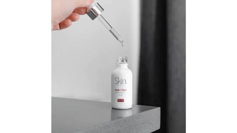 Skins by Dr.  Sharad Neck + Face Smoothing Elixir