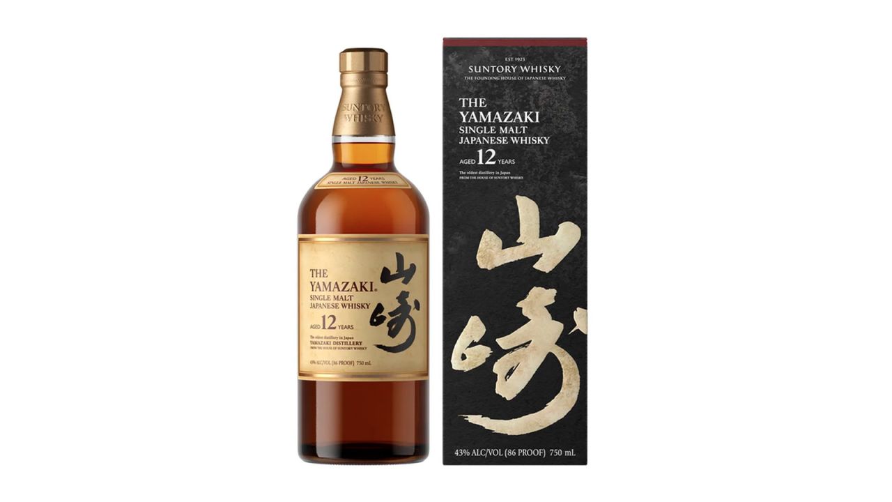 A bottle of Suntory Yamazaki 12-Year Single Malt Japanese Whisky and its box on a white background.