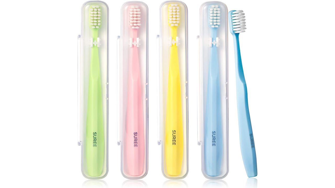 A photo of four Suree Extra Soft Toothbrushes