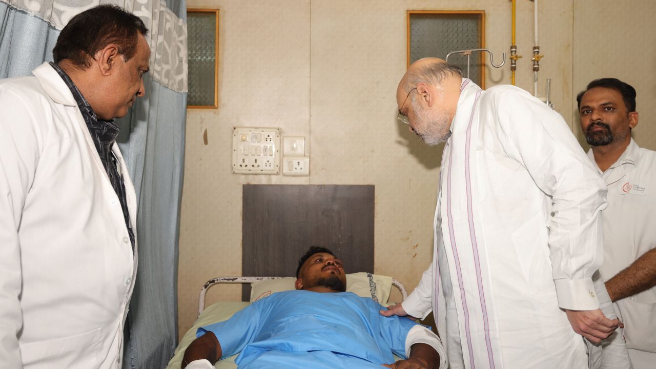 Vishwash Kumar Ramesh during his meeting with Home Minister Amit Shah at the hospital where Ramesh is being treated.