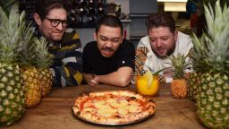 From left, Francis Woolf, Quin Jianoran, and Felix Rehberg, of Lupa Pizza in Norwich, Norfolk. Release date January 12 2025. The owners of a popular pizzeria have declared war on pineapple as a topping- charging £100 for anyone bold enough to order it.  Lupa Pizza in Norwich, Norfolk, has made their opinion on the controversial topping choice very clear by slapping the hefty price tag for a Hawaiian pizza on their Deliveroo menu. The cheeky menu description reads: "Yeah, for £100 you can have it. Order the champagne too! Go on you Monster!" On why the owners decided to charge such a large fee, their answer is simple- they hate pineapple on pizza.  Co-owner Francis Woolf said: "I absolutely loathe pineapple on a pizza."