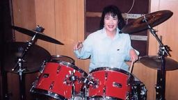 Takaichi is seen playing the drums in an undated photo. She is a fan of heavy metal music.