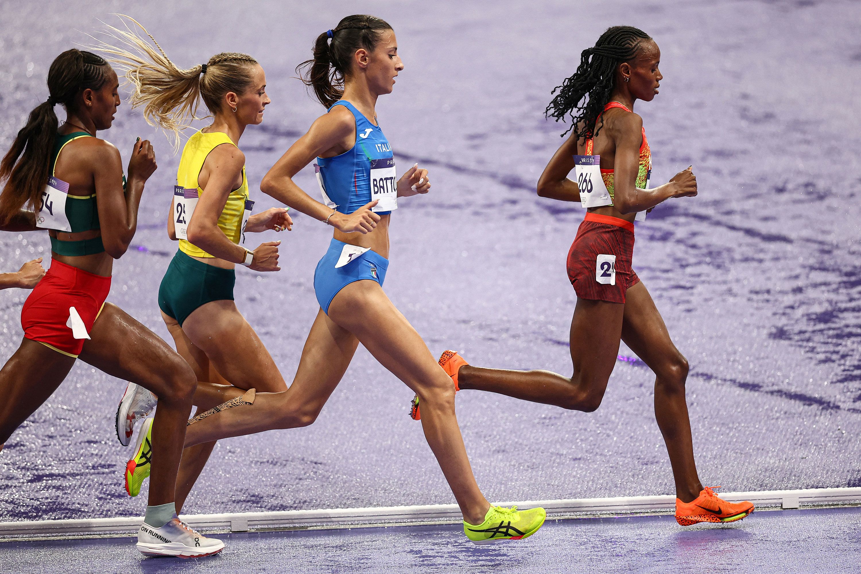 Kenya's Beatrice Chebet leads the pack during the 10,000-meter final on August 9. <a href="https://www.cnn.com/sport/live-news/paris-olympics-news-2024-08-09#h_cf5994c189395d655e8f6917b18aeb87">Chebet won another gold medal</a> to go with the one she won in the 5,000 meters.