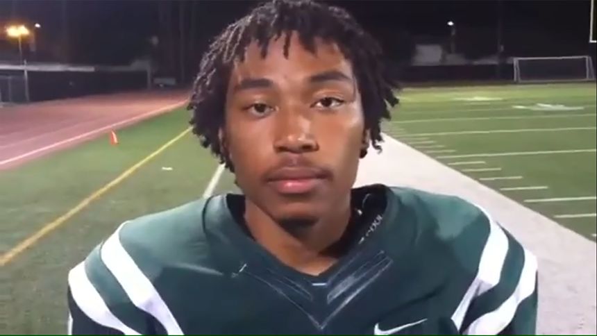 Shane Tamura is seen in a 2015 YouTube interview after scoring the winning touchdown for the Granada Hills Charter School football team.