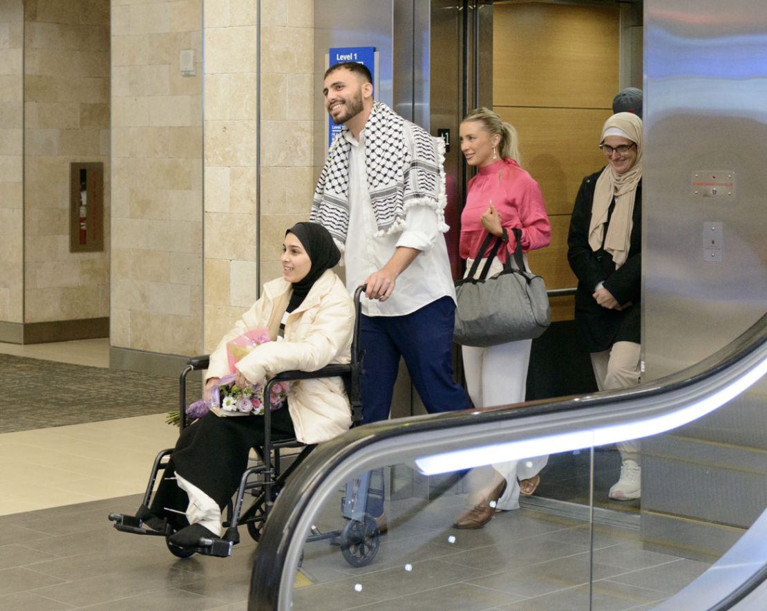 Ahed Bseso’s right leg was amputated at home in Gaza after a tank fired at her building, bringing a wall and debris crashing down on her. She’s seen here in a wheelchair accompanied by PCRF’s Tareq Hailat and Annie Clyborne.
