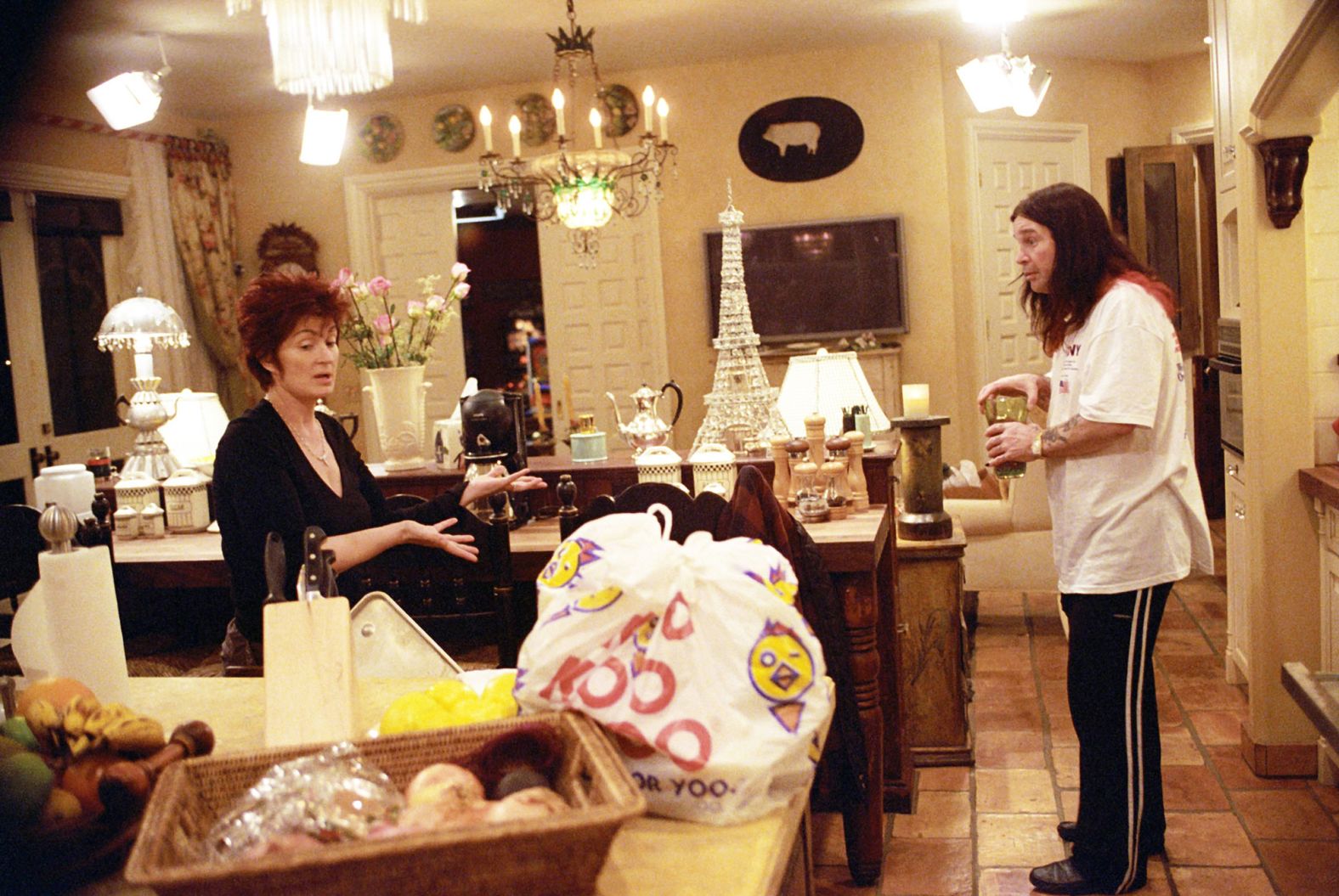 Ozzy and Sharon Osbourne appear in an episode of "The Osbournes," a reality TV show that aired from 2002 to 2005.