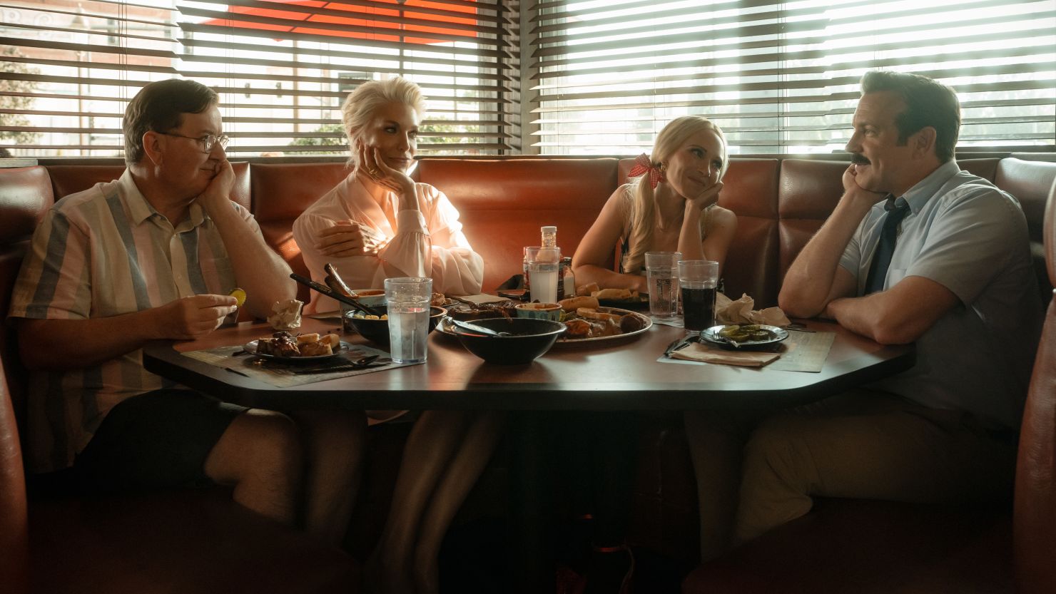 (from left): Jeremy Swift, Hannah Waddingham, Juno Temple and Jason Sudeikis in a new image from "Ted Lasso" Season 4.