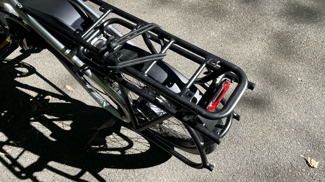 The Tern HSD S+'s rear luggage rack is substantial enough to carry a significant load (up to 132 pounds) and has a two-tiered rail system with plenty of options for attaching bags of various sizes — plus you can stand the bike up on its end for storage courtesy of the rubber-tipped feet towards the rear.