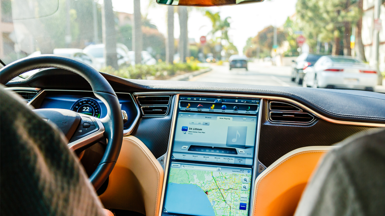 Los Angeles, United States - May 17, 2013: A cockpit with LCD digital speedometer and LCD touch screen of electric car Tesla Model S during drive in Santa Monica, Los Angeles, California. Tesla electric cars are produced by Tesla Motors, Inc. in California, USA.