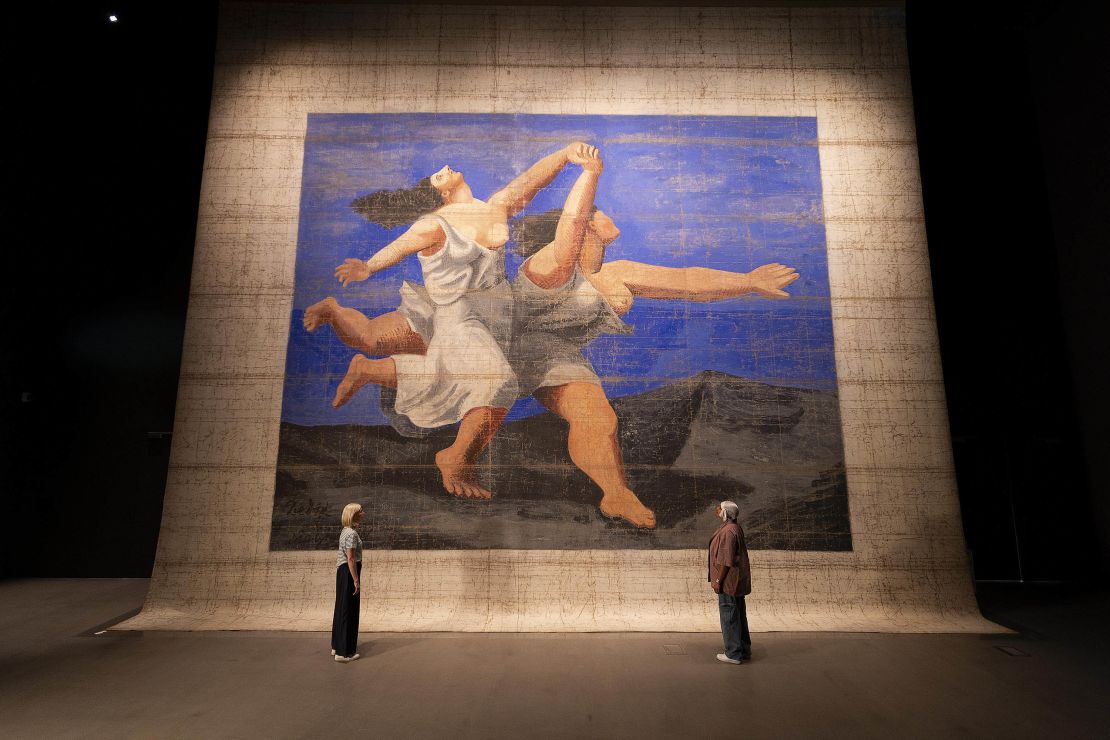 The largest Picasso work in the world, the 1924 front stage cloth for the Ballets Russes’ production, Le Train Bleu, on display at V&A East Storehouse.