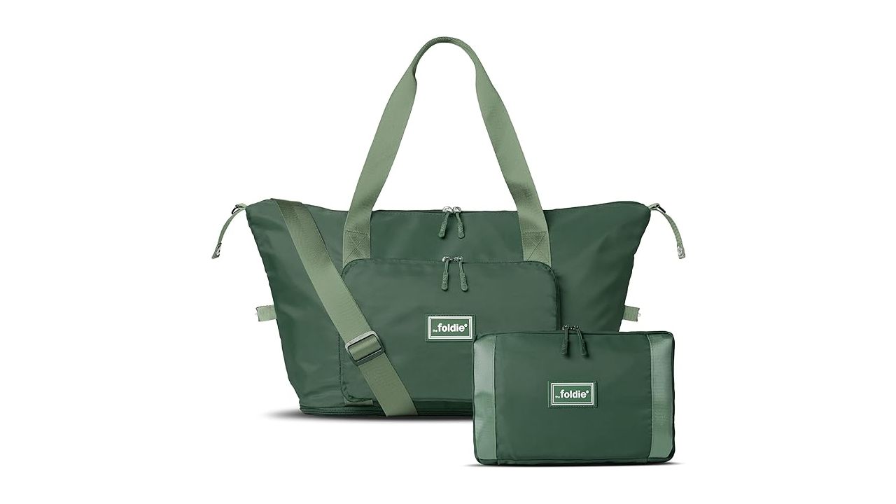 A photo of a green The Foldie 4.0 tote bag