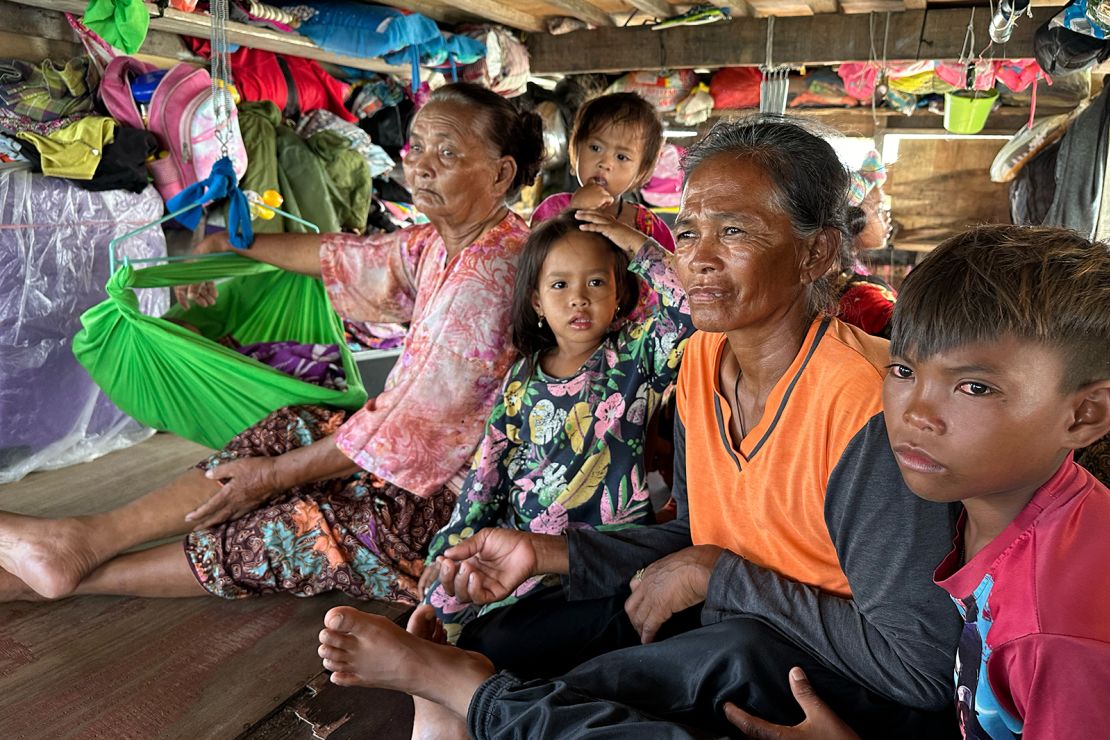 The Sabunglanis are one of the few Bajau Laut families left in the region who still live on a lepa, or houseboat. The family matriarchs, Tursina (left) and Satulina (right), are pictured here with their grandchildren.