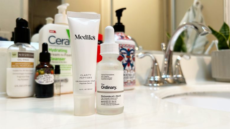 medik8 clarity peptides serum and the ordinary Niacinamide and Zinc Serum on a bathroom countertop