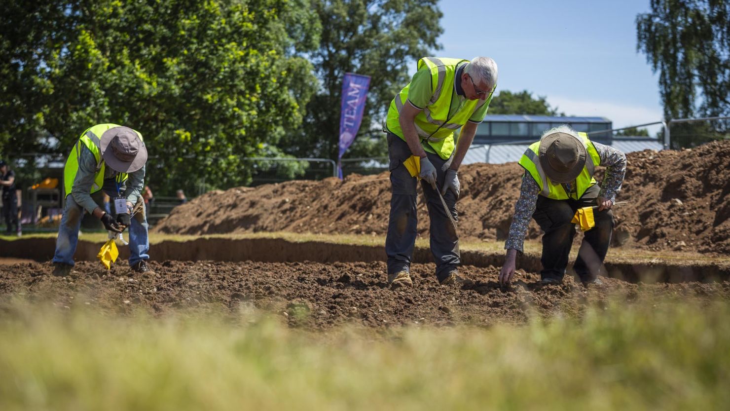 The team from FAS Heritage is seen at work in the trench in Garden Field at Sutton Hoo in Suffolk, England.